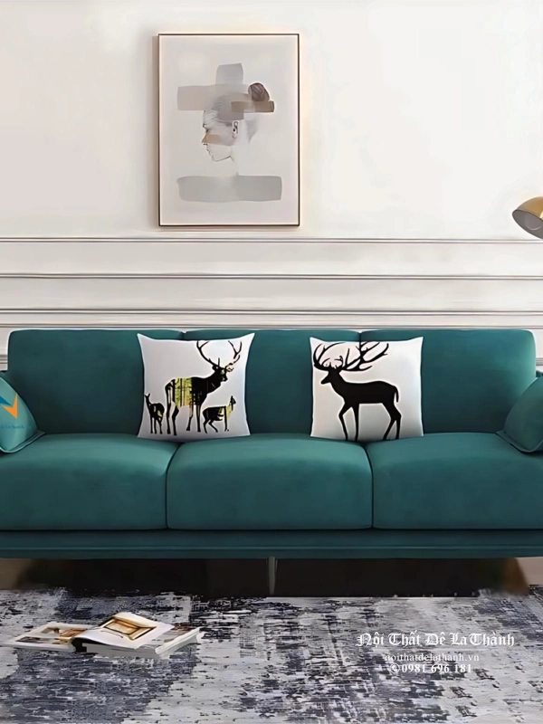 Chiếc văng sofa bọc nỉ màu xanh cổ vịt, dành cho 3 người ngồi, kích thước dài 2m, thiết kế theo phong cách hiện đại