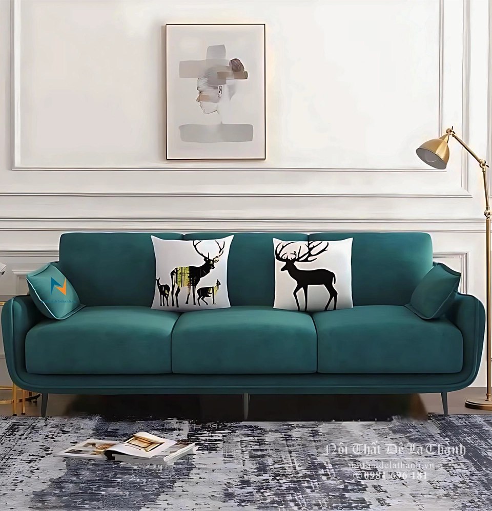 Chiếc văng sofa bọc nỉ màu xanh cổ vịt, dành cho 3 người ngồi, kích thước dài 2m, thiết kế theo phong cách hiện đại