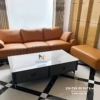 Bộ sofa da giá rẻ gồm một văng dài 2m4 và một cục thông minh 90cm, khung gỗ tự nhiên, da cleo bền đẹp