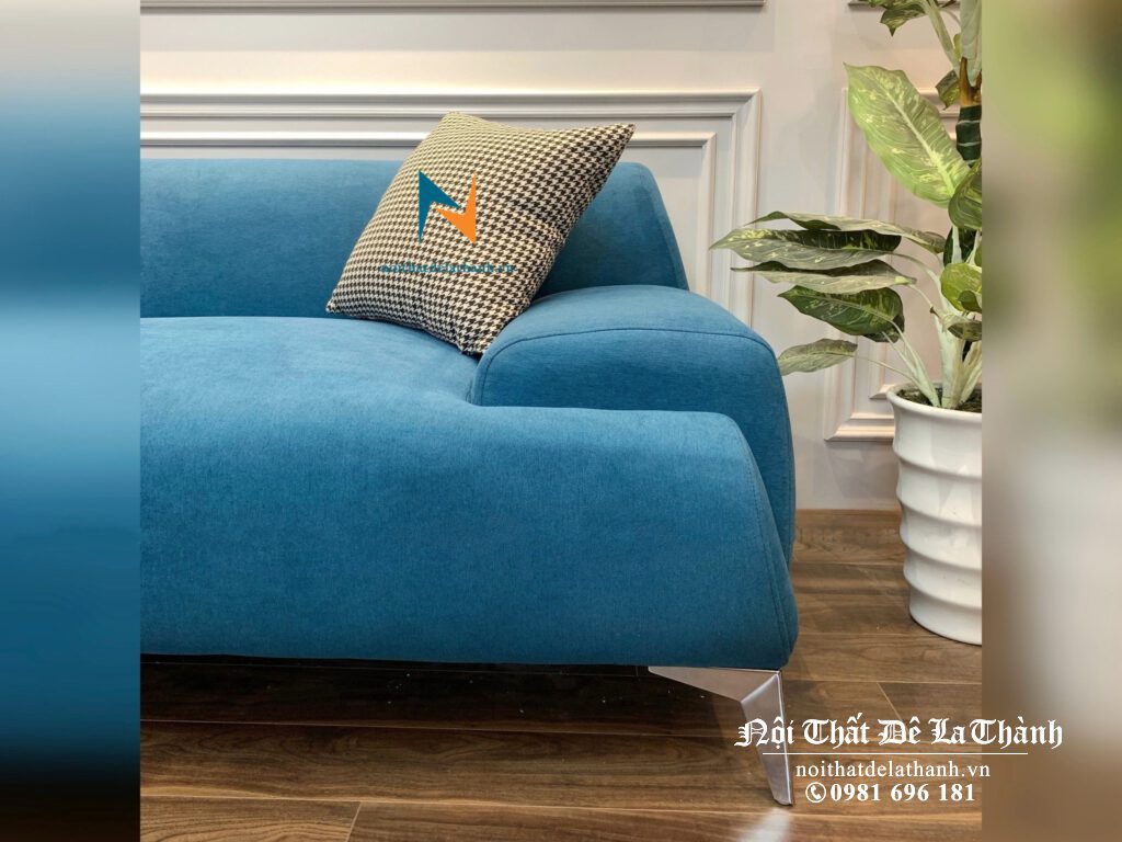 Hình ảnh cận cảnh chiếc văng sofa phong cách Bắc Âu màu xanh