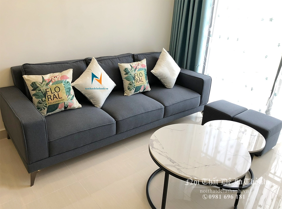 Văng nỉ màu tối có kích thước 2m2x70cm, thiết kế theo phong cách hiện đại, chia thành 3 tựa, chân inox sơn tĩnh điện