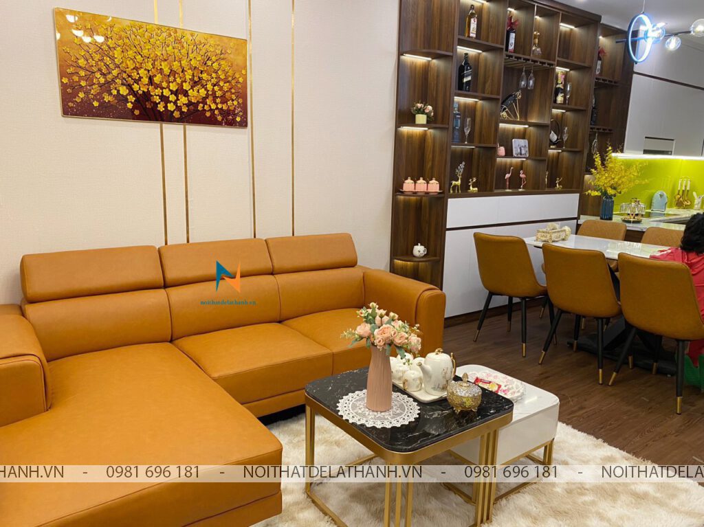 Chiếc sofa da góc chữ L thuộc phân khúc giá rẻ, kích thước 2m2x1m7, màu da bò sang trọng, món đồ làm tôn lên vẻ sang trọng của phòng khách