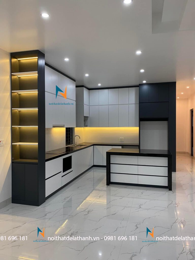 Tủ bếp hiện đại chữ L thùng MDF Thái Lan chống ẩm, cánh phủ melamine với thiết kế 2 màu trắng đen rất đẹp mắt