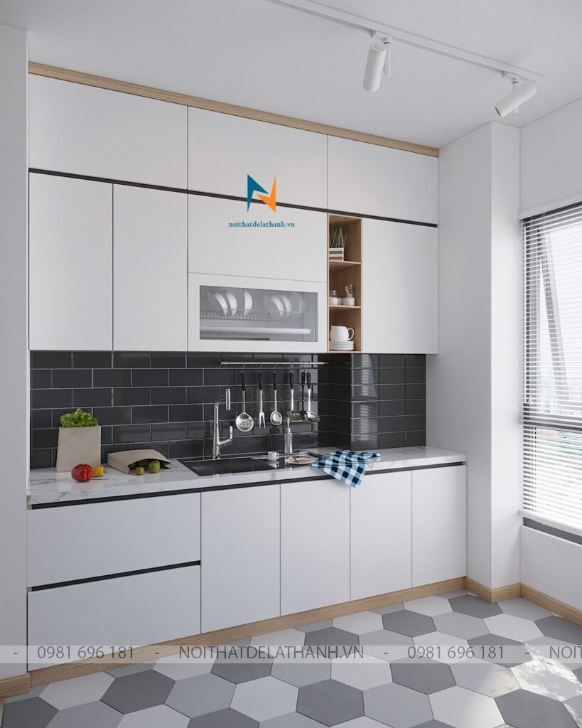 Trong không gian phòng bếp này, màu trắng cũng được xem như màu đơn sắc của chiếc tủ bếp vì nó chiếm hầu như toàn bộ tone màu của chiếc bếp
