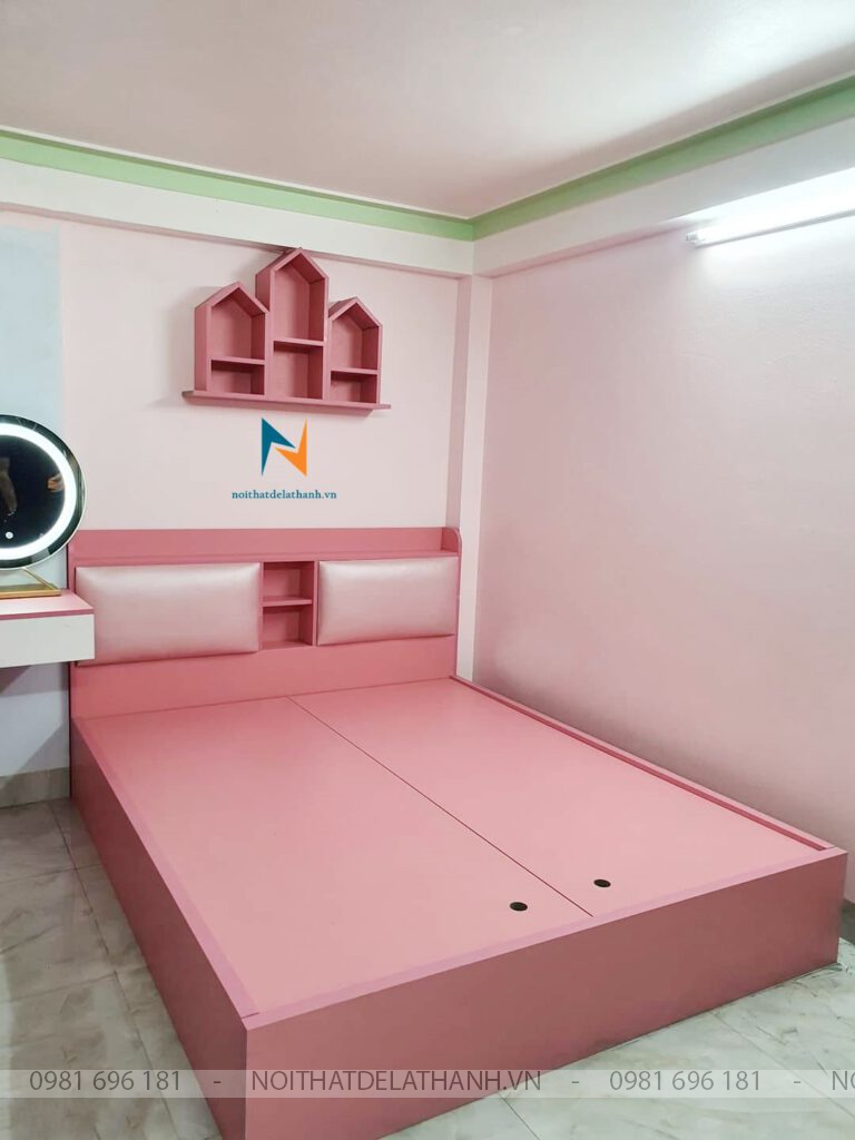 Chiếc giường gỗ công nghiệp MDF phủ melamine chống xước màu hồng, kích thước 1m4x2m dành cho bé gái, đầu hộp gắn nệm da rất đẹp mắt