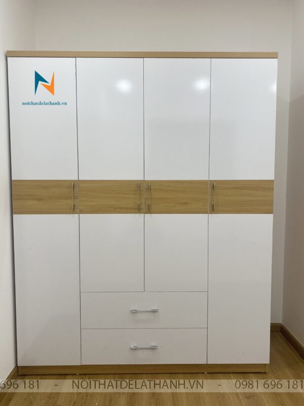 Chiếc tủ quần áo 1m6 chất liệu gỗ MDF phủ melamine chống xước, thân tủ màu sồi, cánh tủ màu trắng với một vệt gỗ chạy ngang thân tủ làm điểm nhấn