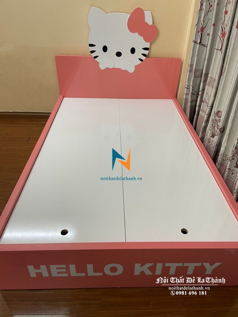 Chiếc giường ngủ hello kitty màu hồng pha trắng dành cho bé gái với điểm nhấn là chú mèo thắt nơ rất xinh