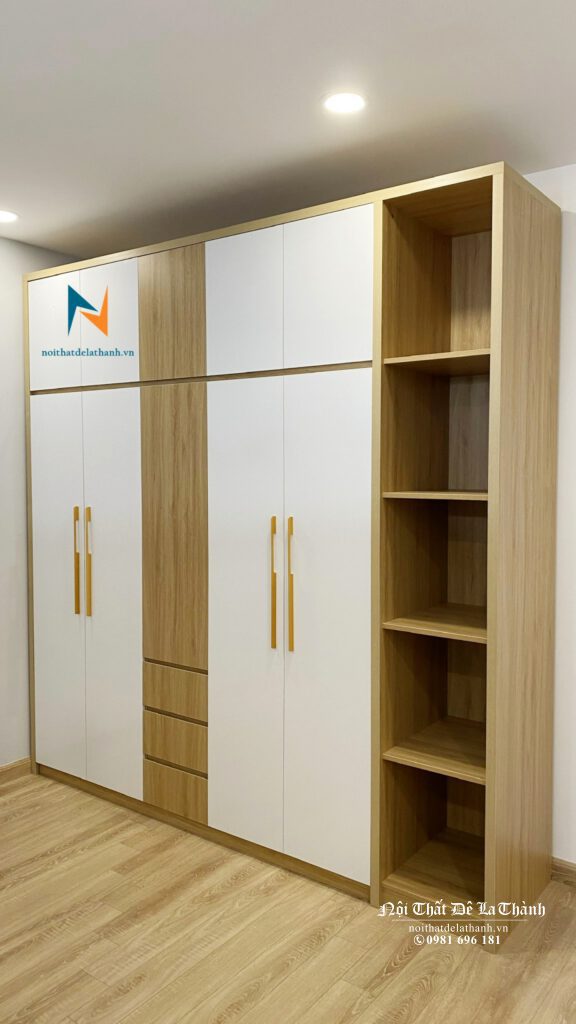 Chiếc tủ hiện đại chất liệu gỗ công nghiệp MDF với thiết kế có kệ góc trang trí, kích thước 2m4x2m45, thiết kế 2 tầng pha cánh trắng rất đẹp