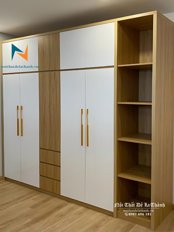 Tủ hiện đại thiết kế kèm kệ trang trí ở góc phải, tủ có 2 tầng, màu phối giữa màu gỗ vàng và màu cánh trắng rất đẹp