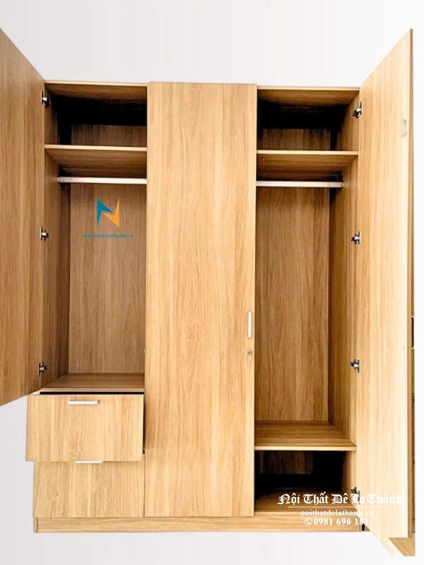 Chiếc tủ gỗ công nghiệp mdf được thiết kế theo phong cách hiện đại, toàn thân màu vàng 388, kích thước 1m6x2m45, có 2 buồng, 3 cánh và 2 ngăn kéo