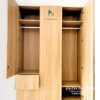 Chiếc tủ gỗ công nghiệp mdf được thiết kế theo phong cách hiện đại, toàn thân màu vàng 388, kích thước 1m6x2m45, có 2 buồng, 3 cánh và 2 ngăn kéo