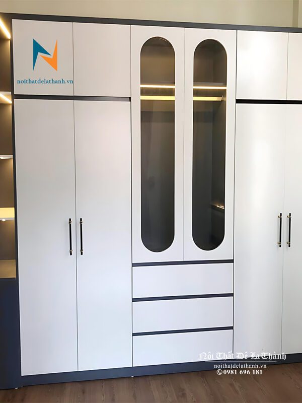 Chiếc tủ quần áo gỗ mdf hiện đại thiết kế 2 tầng, 4 cánh gỗ, 2 cánh kính và 1 kệ góc trang trí rất đẹp mắt