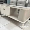 Chiếc bàn trà nhập khẩu có màu ghi sáng tổng thể, kích thước 50cmx1m, chất liệu gỗ MDF pha gỗ tự nhiên, mặt đá ceramic màu vân mây rất đẹp