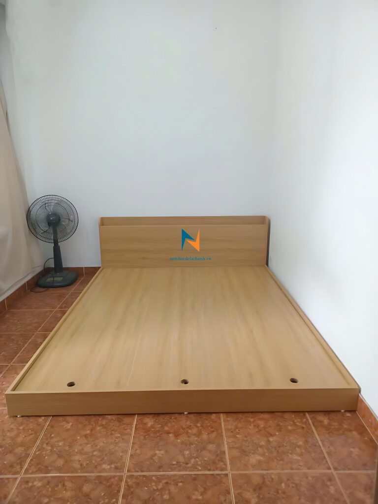 Giường bệt gỗ ép màu vàng, kích thước 1m4x2mx18cm