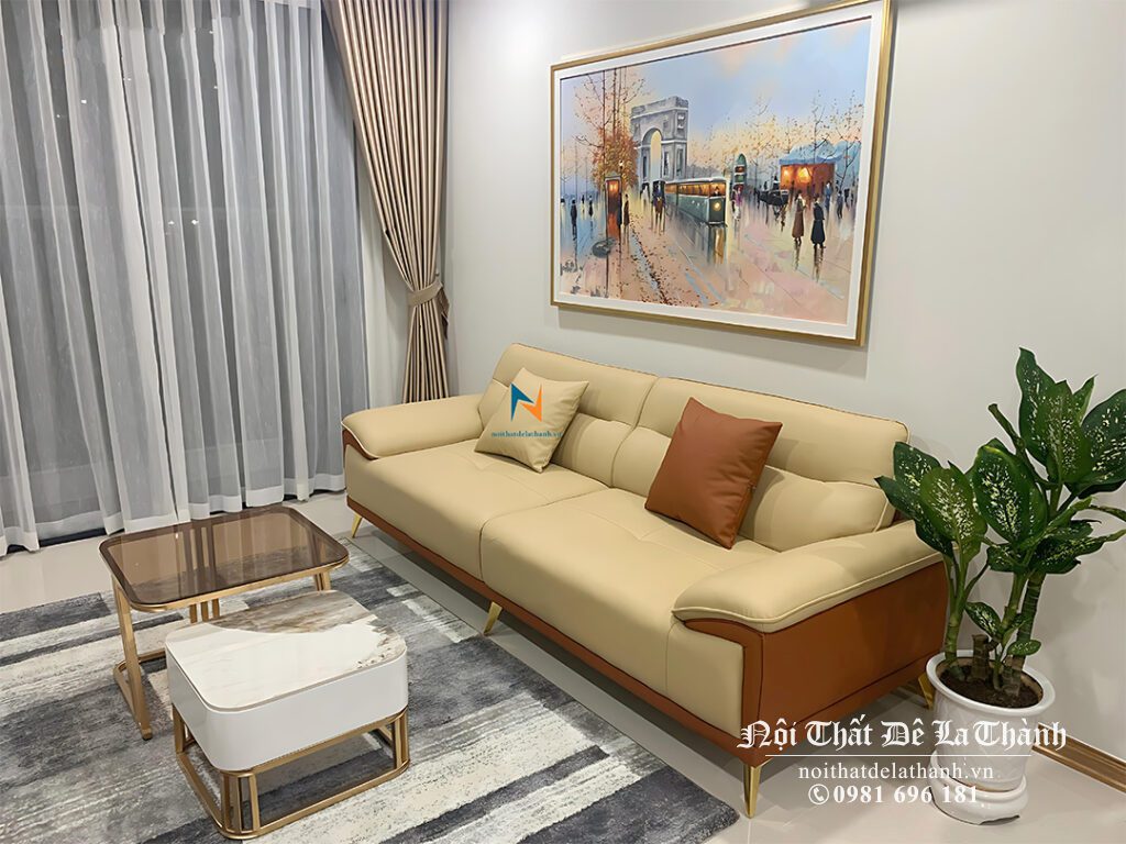 Chiếc ghế sopha văng da, dài 2m2, mix 2 màu da bò và màu kem, phong cách hiện đại rất đẹp mắt