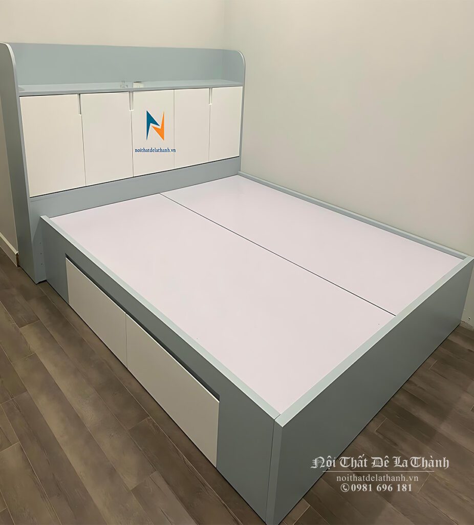Chiếc giường hộp gỗ công nghiệp mdf 1m8x2m có thiết kế siêu xinh khi pha giữa màu xanh nhạt và màu trắng, 2 ngăn kéo bên vai trái giường dùng đựng đồ