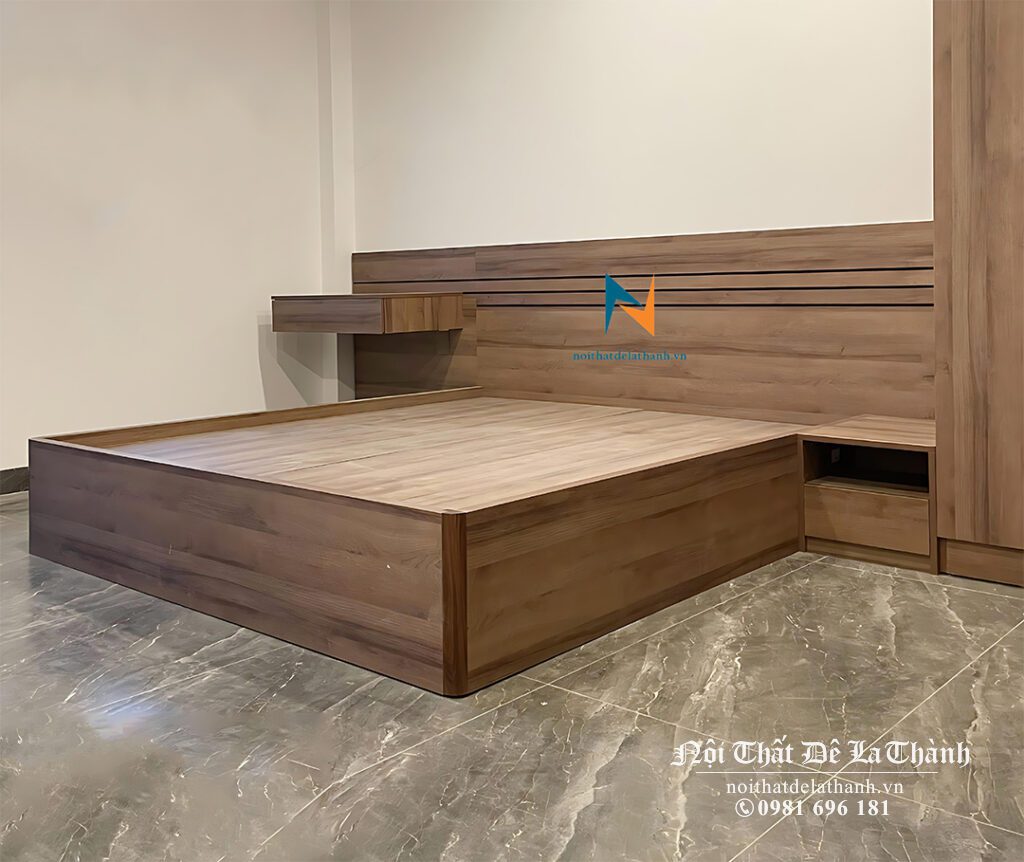 Chiếc giường hiện đại 1m8x2m đầu cao thiết kế liền mạch với vách cao đầu giường gắn liền táp và bàn phấn