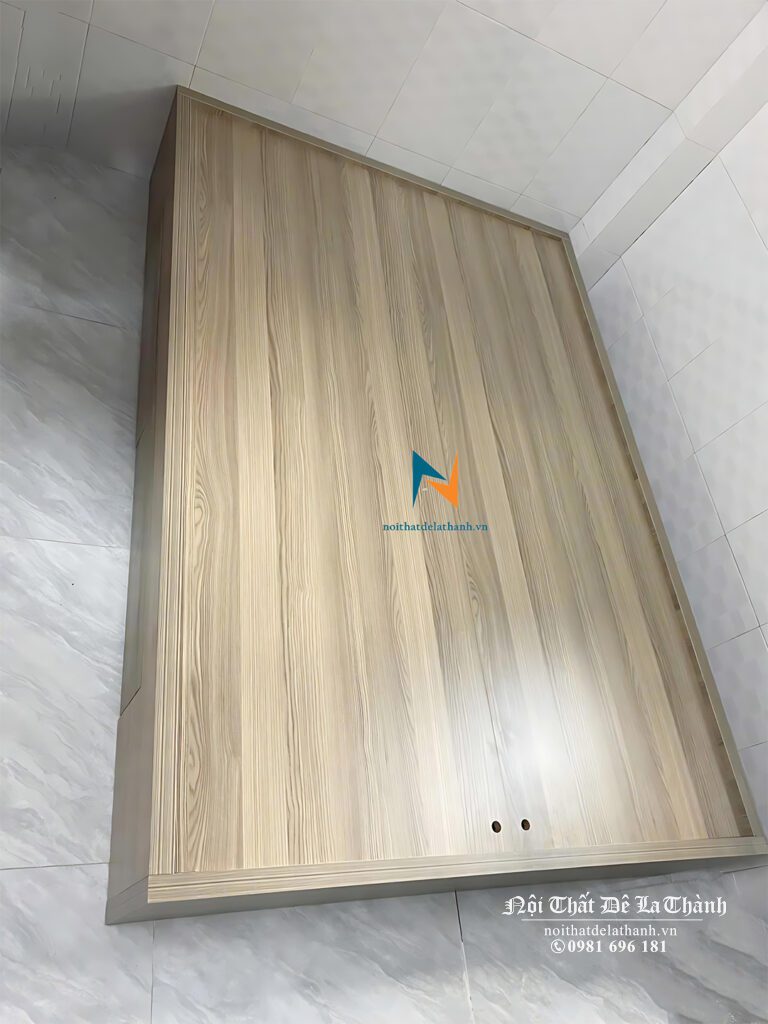 Chiếc giường ngủ giá rẻ không đầu cao 1m4x2m màu xám, gỗ công nghiệp mdf