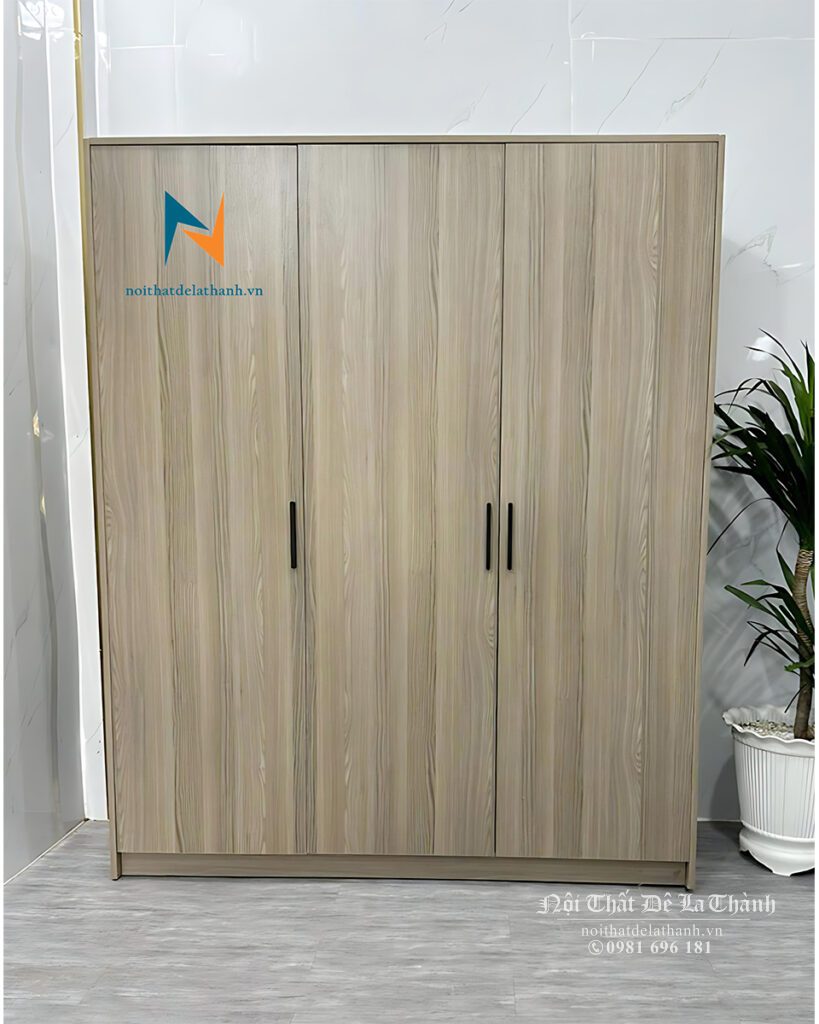 Chiếc tù quần áo gỗ công nghiệp mdf màu nâu sáng, kích thước 1m5x2m, phân khúc giá rẻ, thiết kế theo phong cách hiện đại với 2 buồng, 3 cánh