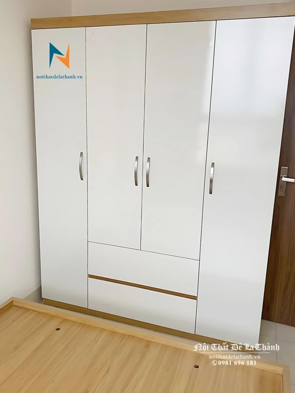 Chiếc tủ 4 cánh giá rẻ, màu 388 pha cánh màu trắng, gồm 2 cánh dài, 2 cánh cộc, 2 ngăn kéo
